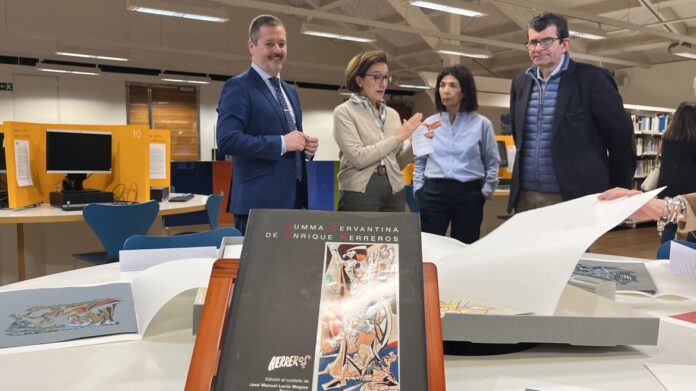 El consejero Mariano de Paco Serrano visualiza las ilustraciones de El Quijote de Enrique Herreros de la Biblioteca Regional